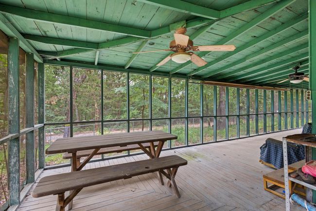 Sunroom featuring ceiling fan | Image 19