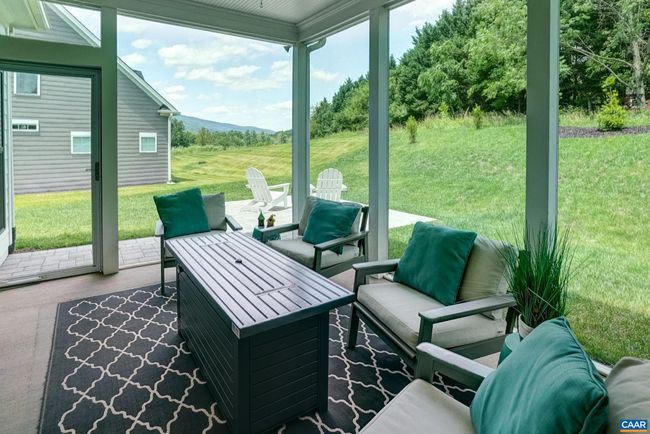 Unwind on the screened porch. | Image 25