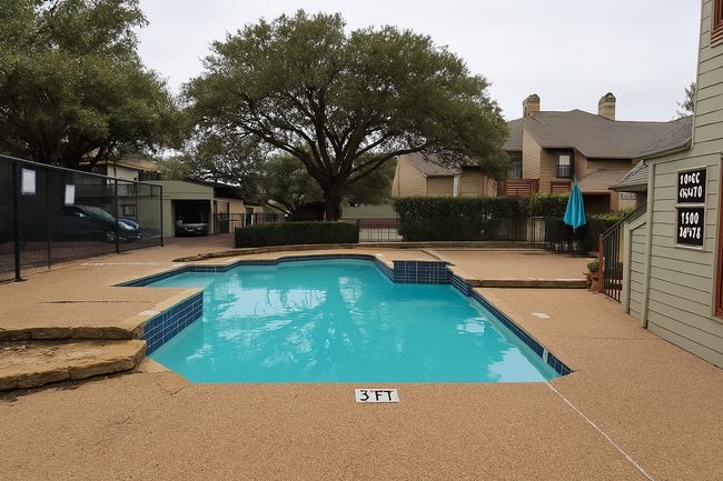 View of swimming pool featuring a patio area | Image 13