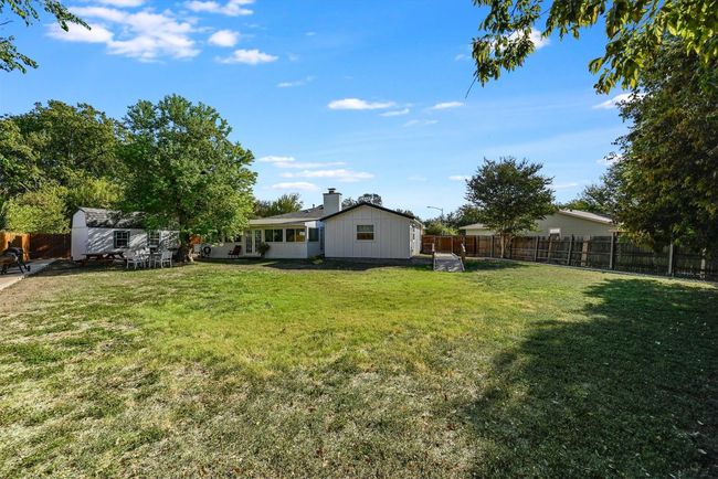 A storage shed adds convenience while keeping tools and gear tucked away, leaving more room to enjoy the outdoor space | Image 20