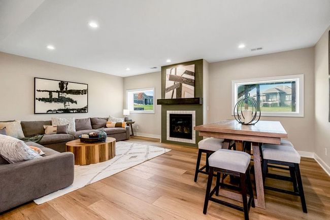 Lower level Rec area with 2 bedrooms and full bath. Photos of previous model home. Not actual listing. Features and sizes may vary. Contact agent for details & showings! | Image 21
