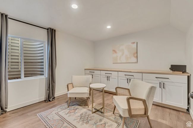 Sitting room with light wood-style flooring and recessed lighting | Image 26