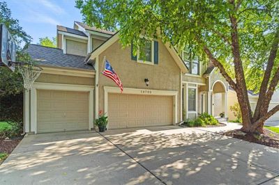 Flat driveway with generous 3-car garage! | Image 1