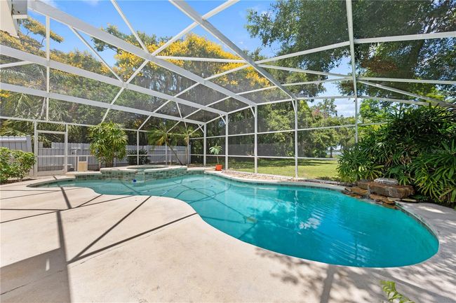 Main Home - This heated pool and spa is perfect year round! | Image 54