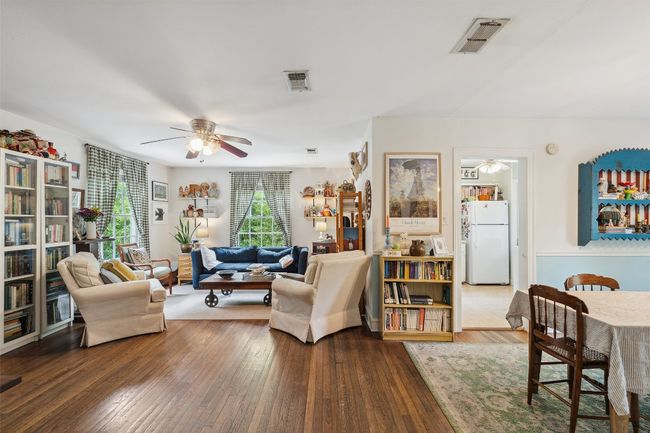 Main living area with original hardwood floors | Image 4