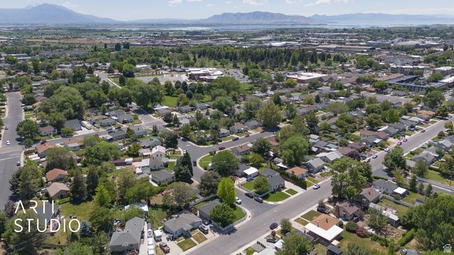 Aerial overview of property's location featuring mountains and nearby suburban area | Image 22