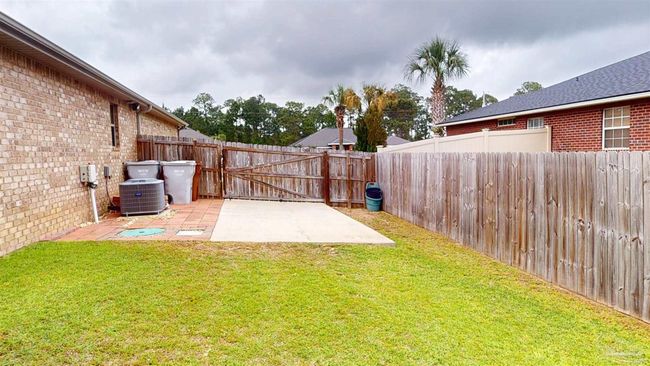 7445 Brevard St, House other with 4 bedrooms, 3 bathrooms and 6 parking in Navarre FL | Image 38