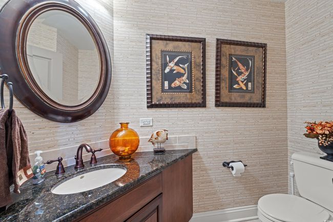 Bathroom with toilet and vanity | Image 29
