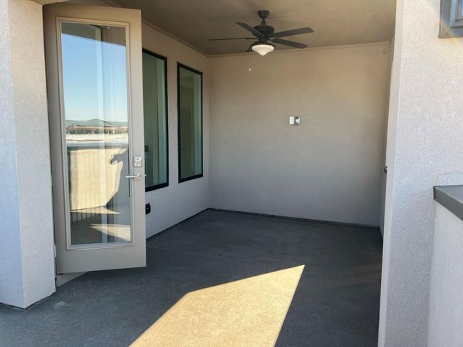 View of patio with ceiling fan | Image 13