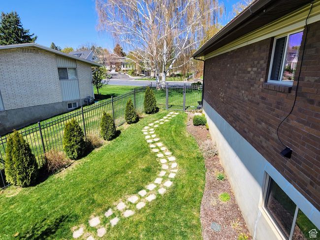 View of yard with a fenced backyard | Image 18