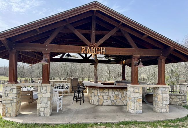 View of patio featuring a gazebo and outdoor dry bar | Image 28