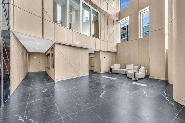 Community lobby featuring a high ceiling | Image 20