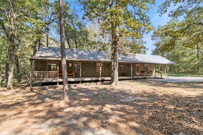 Relax and unwind on the large covered porch | Image 3