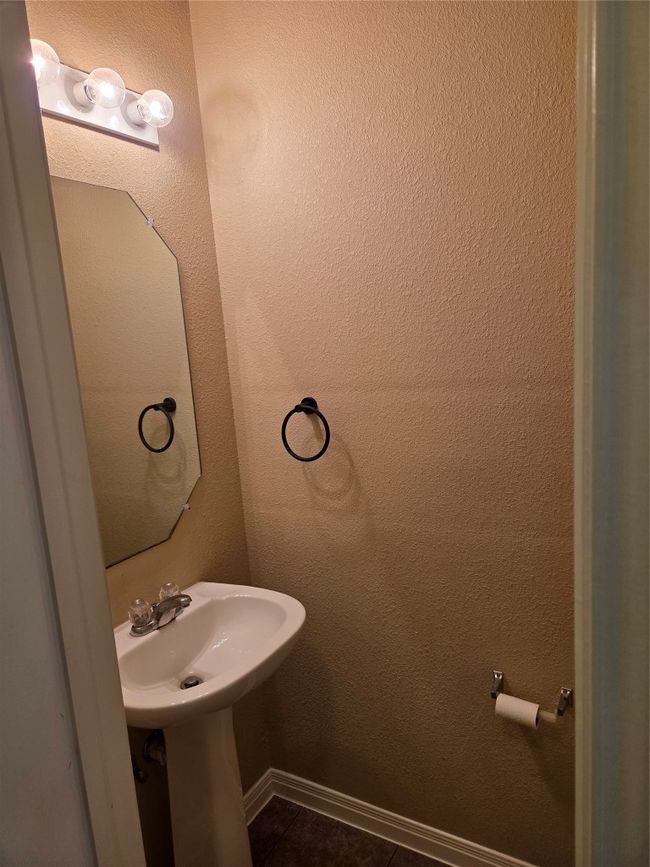 Bathroom with tile patterned floors | Image 14