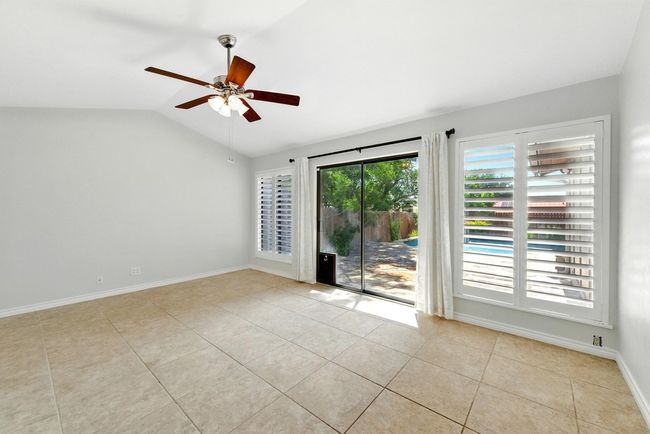 Sunroom with slider to rear patio and pool - check out the built in dog door! Woof Woof! | Image 16