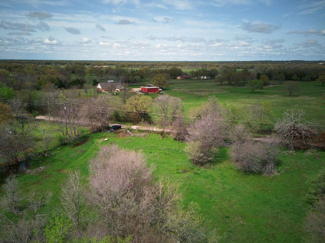 the front road is County Rd 4061 . This is a partial view of entrance . | Image 20