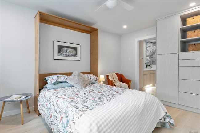 Spare bedroom with Murphy bed and custom built cabinets | Image 22