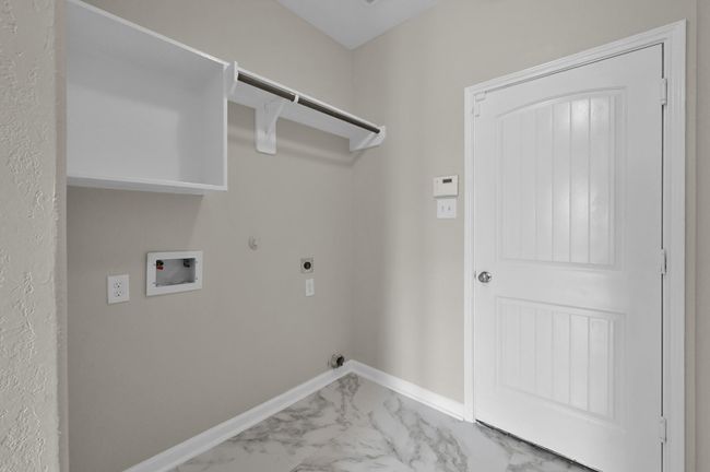 Utility room. Door is to the Garage. | Image 37