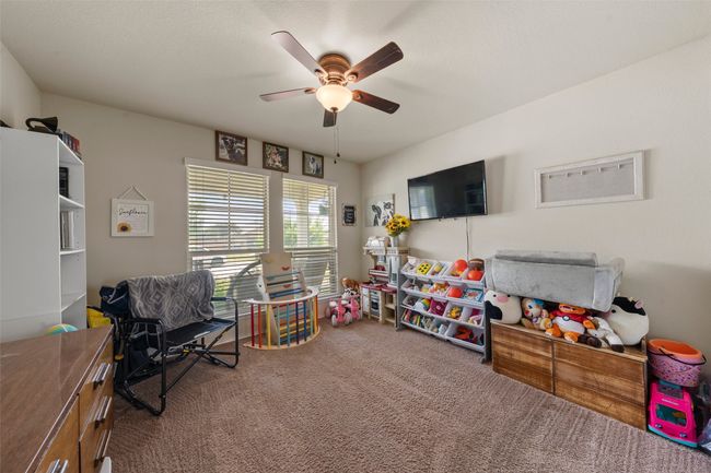 Playroom with carpet and ceiling fan | Image 7