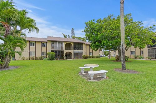 2-311 Pine Ridge Cir, Greenacres, FL, 33463-1997 | Card Image