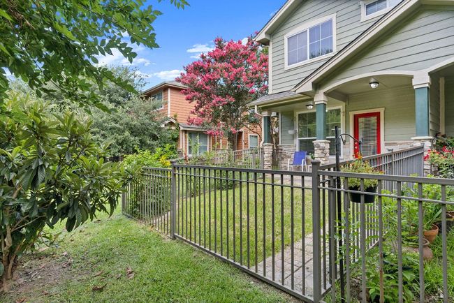 Beyond the gate - back yard! Welcome to your new greenbelt patio! | Image 33
