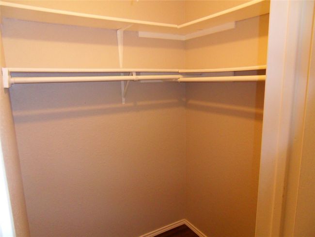 View of spacious closet | Image 12