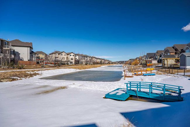 24 Bayside Link Sw, Home with 4 bedrooms, 3 bathrooms and 5 parking in Airdrie AB | Image 41