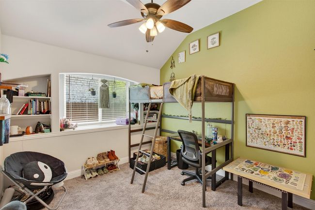 Office space featuring vaulted ceiling, ceiling fan, and carpet floors | Image 29