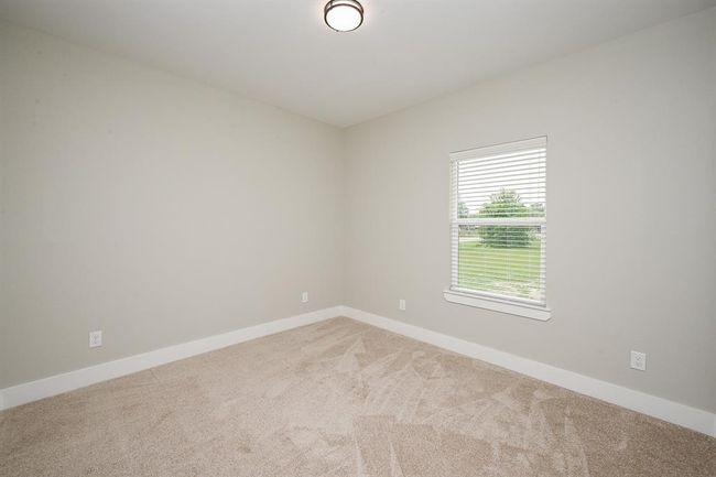 Third Bedroom Looks Out To The Backyard and Provides Lots Of Natural Lighting | Image 16