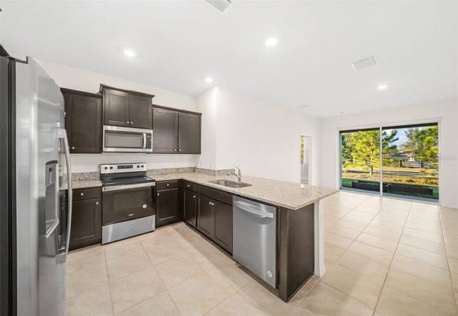 8051 Penrose Place, House other with 3 bedrooms, 2 bathrooms and null parking in Wildwood FL | Image 33