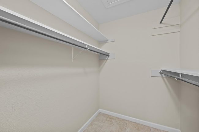 walk in closet in bedroom | Image 16
