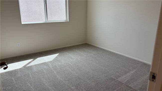 Carpeted empty room with baseboards | Image 12