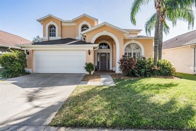 16605 Meadow Gardens Street, House other with 4 bedrooms, 2 bathrooms and null parking in Tampa FL | Image 1