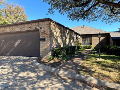 Single story home with a garage | Image 2