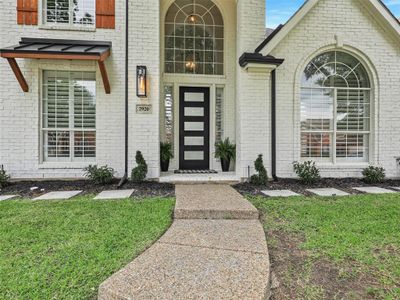 Doorway to property with a yard | Image 2