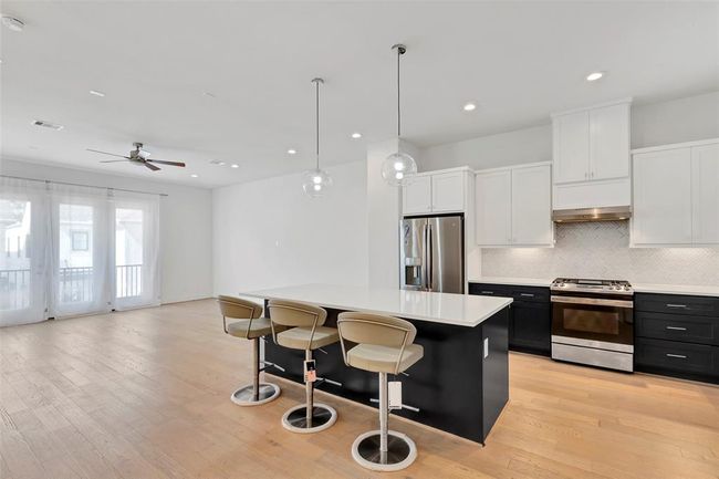 Additional photo of the spotless kitchen. | Image 15
