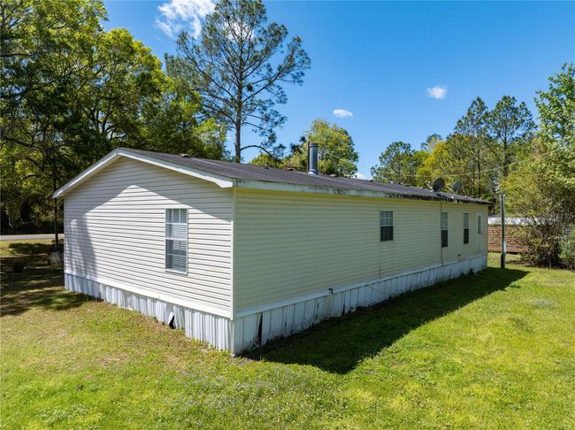 22463 Ne 149 Th St, House other with 3 bedrooms, 2 bathrooms and null parking in Raiford FL | Image 27