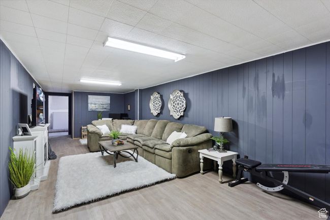 Living room featuring wood finished floors | Image 19