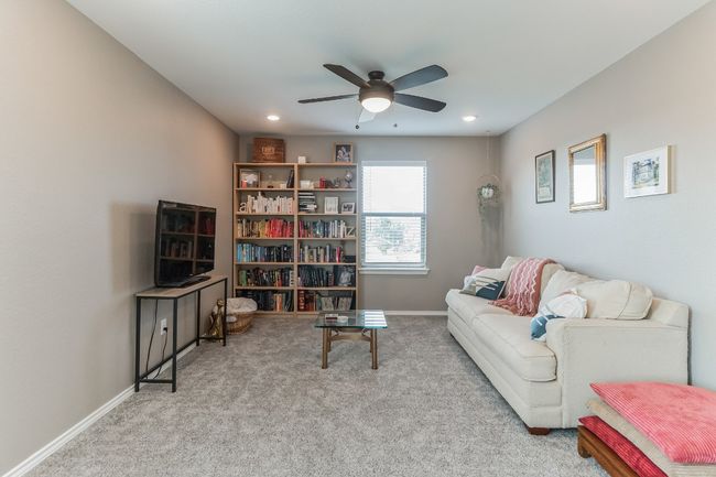 Living area featuring ceiling fan, carpet floors, and recessed lighting | Image 17