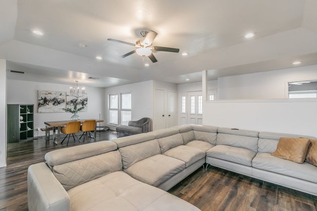 Unit 4900 Another view of Living room towards dining room | Image 8