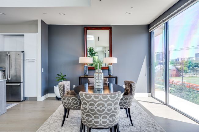 Dining area featuring baseboards, recessed lighting, and light wood-style floors | Image 14