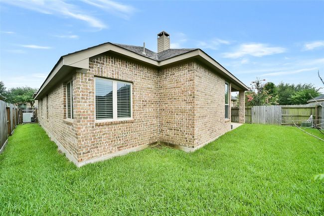All sides of this home have beautifully maintained brick. | Image 29