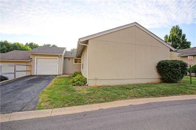 View of front facade with a garage | Image 2