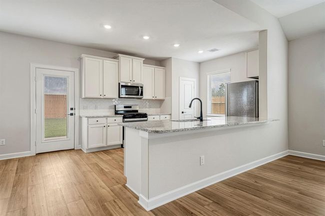 15683 Honey Cove Dr, House other with 4 bedrooms, 2 bathrooms and 2 parking in Conroe TX | Image 6