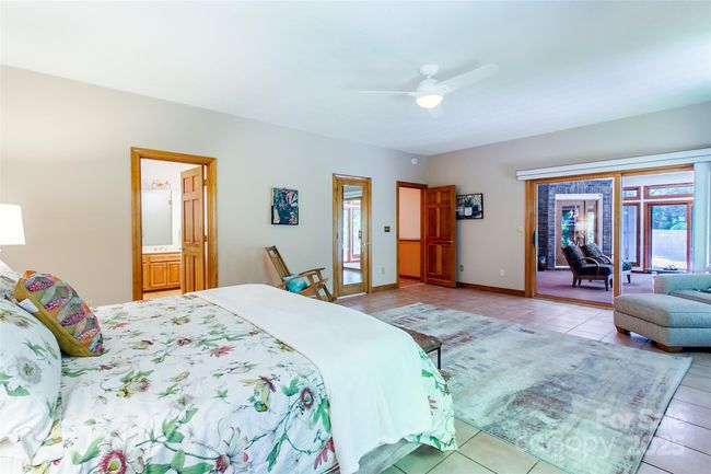 What a great view into the four season room. Blinds provide privacy when desired. | Image 20