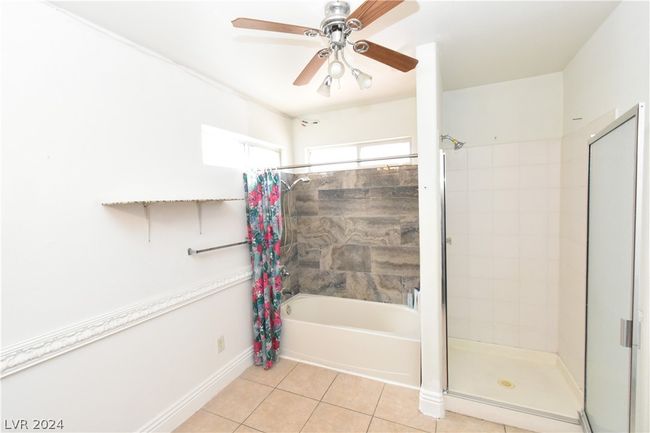 main bathroom with tub and separate shower | Image 31