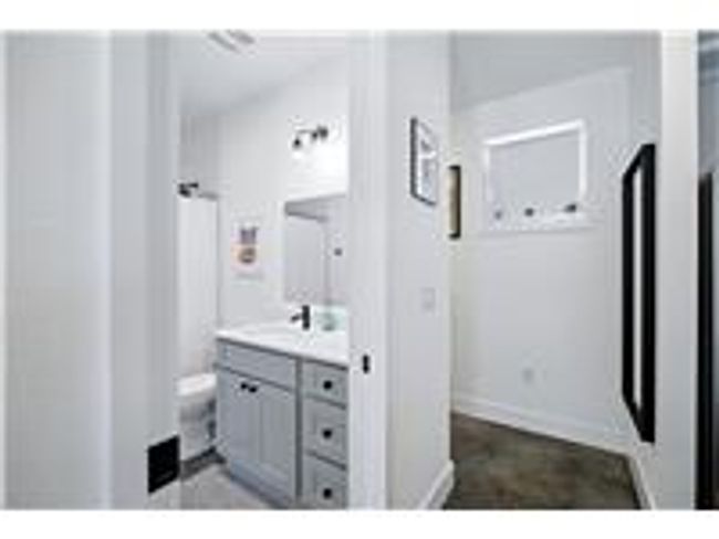 Main floor full bath next to the stairwell | Image 17