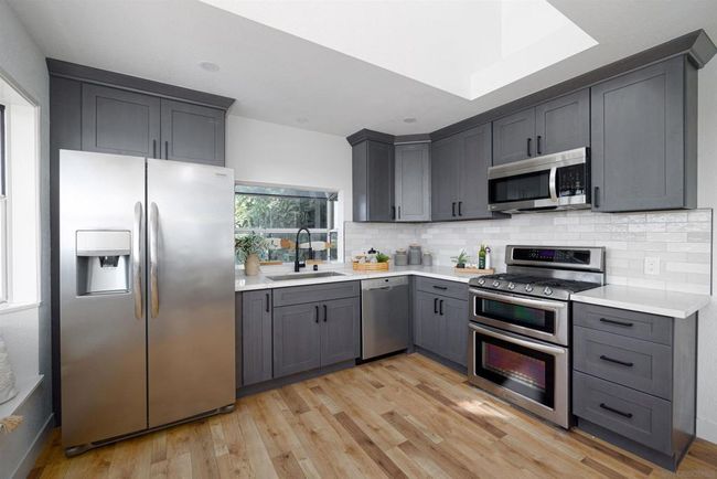 Kitchen in the above garage apartment | Image 41