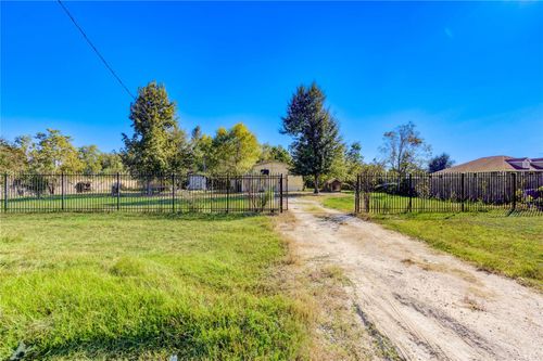 910 County Road 3556, Cleveland, TX, 77327-1940 | Card Image