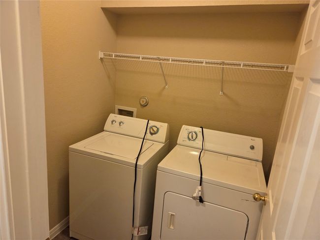 Washroom featuring washing machine and dryer | Image 15